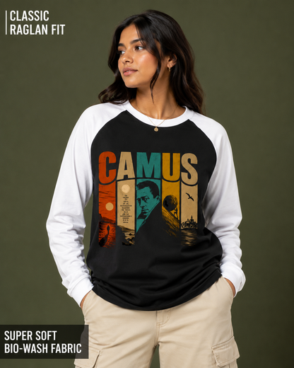A woman wearing a black and white raglan long-sleeve shirt with a colorful retro-style 'CAMUS' graphic on the front, paired with beige cargo pants, against a dark olive background. Text overlays highlight the product features.